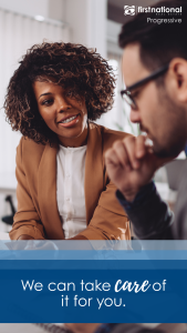 A woman talking to a man while sitting down.